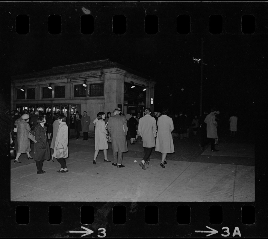 People outside of the Boylston T stop in Boston during blackout
