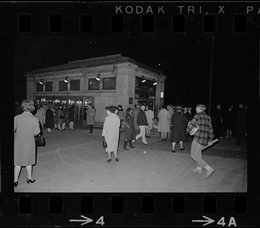 People outside of the Boylston T stop in Boston during blackout