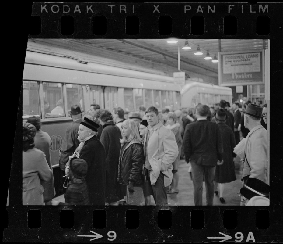 People on subway platform waiting in front of MTA train during Boston blackout