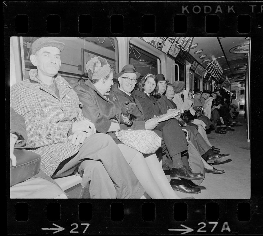 Row of people on train during Boston blackout