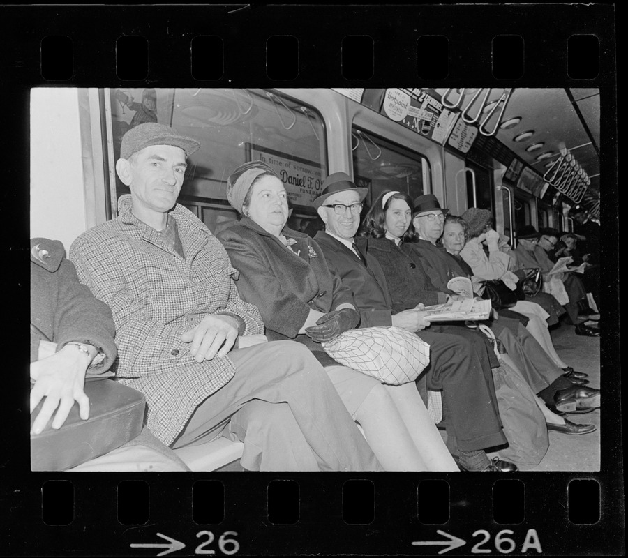 Row of people on train during Boston blackout