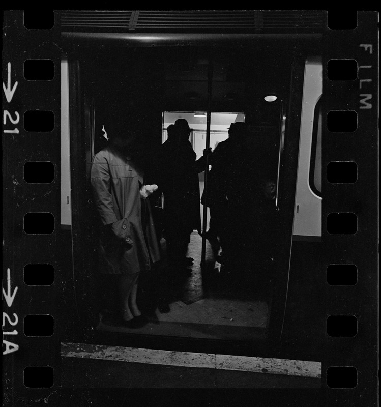 Passengers waiting in dark train car during Boston blackout