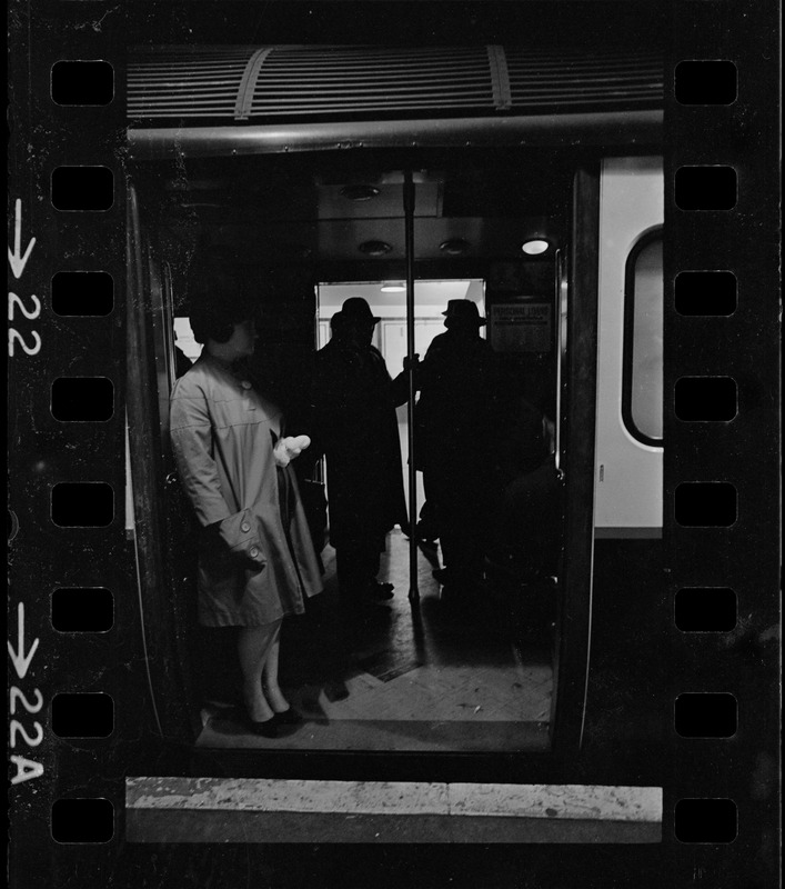 Passengers waiting in dark train car during Boston blackout