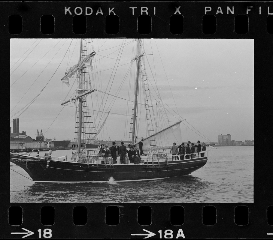 People on deck of Black Pearl heading into Boston Harbor during the commemoration of the Hawaiian Mission Sesquicentennial