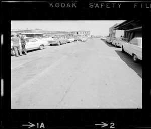 Street with cars parked on both sides