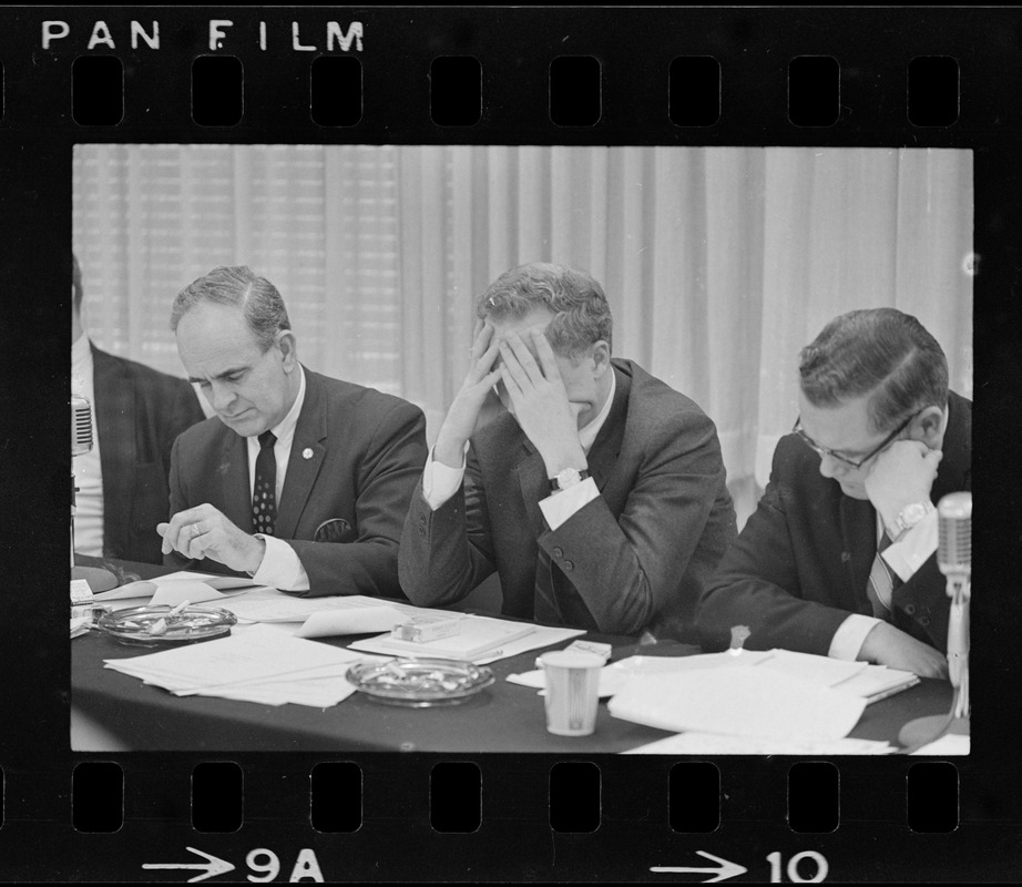 Boston's Mayor Kevin H. White, displaying the care of office, rests his head in his hands during MBTA Advisory Board Meeting at which plans for Mattapan Repair Yards and Rapid Transit Extension were approved