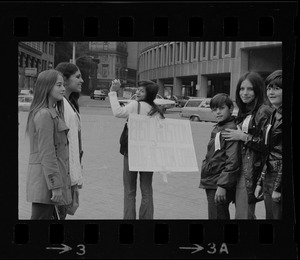 Group of women, one holding sign, "East Boston Drug Action Comm."