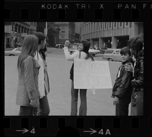 Group of women, one holding sign, "East Boston Drug Action Comm."
