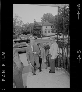 Boston Mayor Kevin White walking into meeting with residents of Roslindale to discuss more police protection following the murder of 3-year-old boy Robert Jankowski