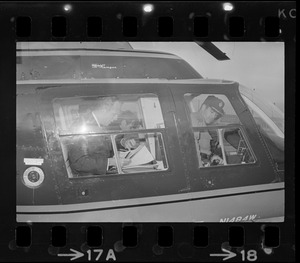 Boston Mayor Kevin White inside of police helicopter, about to survey the city from above