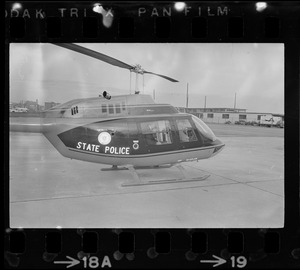 Boston Mayor Kevin White inside of police helicopter, taking off in order to survey the city from above