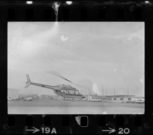 Boston Mayor Kevin White inside of police helicopter, taking off in order to survey the city from above