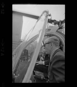 Mayor Kevin White and others inspect the police helicopter's cock pit