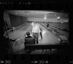 Mayor Kevin White talking with Boston Police bowling team member at Lucky Strike Alley