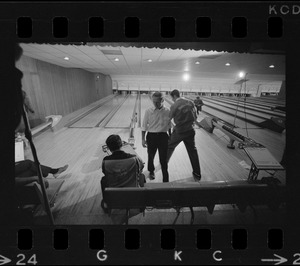 Mayor Kevin White walking back to waiting area after turn with the Boston Police bowling team at Lucky Strike Alley