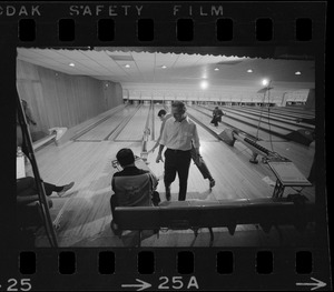 Mayor Kevin White walking back to waiting area after turn with the Boston Police bowling team at Lucky Strike Alley