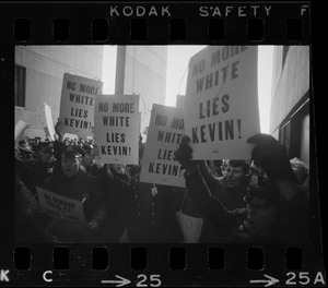 Members of the Boston Police Ass'n are outspoken in their demands that Mayor White keep his promise of equal pay for equal work in a boisterous assembly at City Hall after White's inauguration