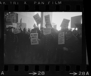 Members of the Boston Police Ass'n are outspoken in their demands that Mayor White keep his promise of equal pay for equal work in a boisterous assembly at City Hall after White's inauguration