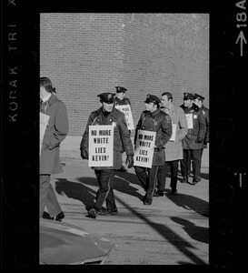 Boston police demonstrators picketing for equal pay for equal work