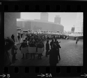 Members of the Boston Police Association picketing for equal pay for equal work outside of City Hall after White's inauguration