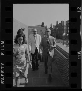 Boston Mayor Kevin White talking while on tour of new schools with others