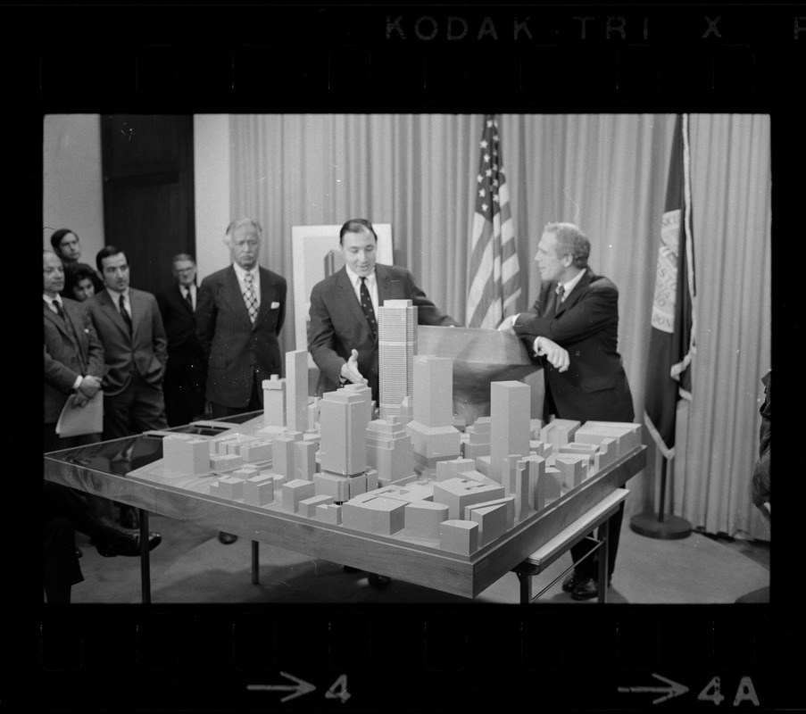 Mayor White, right, with architect Pietro Belluschi, left, and developer Daniel Rose, middle, looking at model of area where 60-story skyscraper is to be constructed
