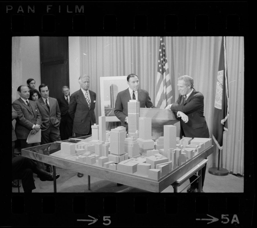 Mayor White, right, with architect Pietro Belluschi, left, and developer Daniel Rose, middle, looking at model of area where 60-story skyscraper is to be constructed