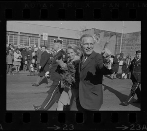 The first dignitary in the line of march at the St. Patrick's Day parade in South Boston was Mayor Kevin White who walks with his wife