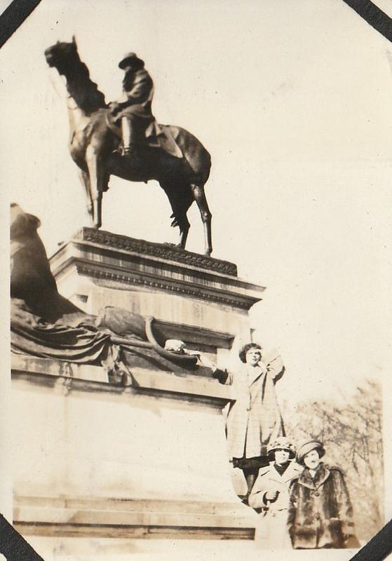 Three women standing at base of Ulysses S. Grant Memorial Washington, D.C.