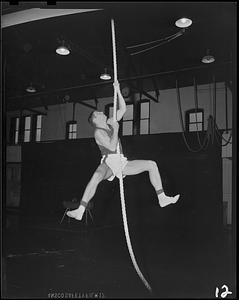 SC gymnast climbing rope