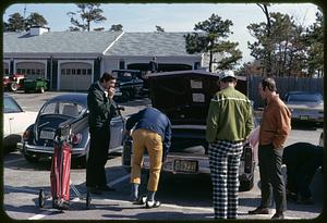 Golfers in parking lot