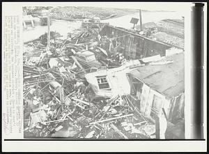 Twister Rubble--A tornado smashed into the town of Inverness, Miss., Sunday, killing at least 13 persons and flattening the business district. Shown is what's left of a large building in the downtown area. The Sunday twisters killed 59 persons in Mississippi and six others in Louisiana.