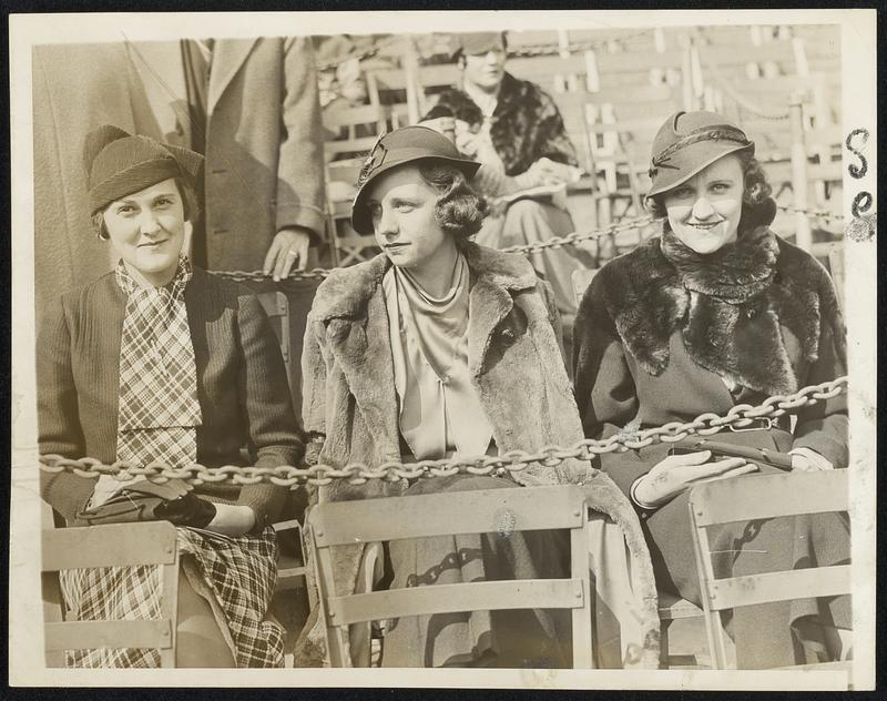 Mrs. Luke Sewell, Mrs. Charles Myer and Mrs. Jack Russell, wives of Washington players watch hubbies play in the world series.