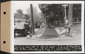 Contract No. 71, WPA Sewer Construction, Holden, applying seal-coat to new tar walk, looking northwesterly on Main Street from intersection with Maple Street, Holden Sewer, Holden, Mass., May 22, 1941