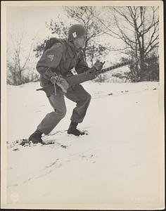 Sgt. Henry Oppenborn advances during a problem in conjunction with "Exercise Snowdrop"