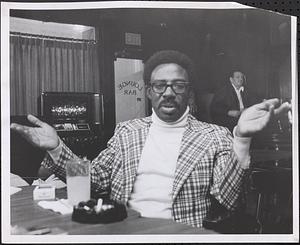 Tanya Rienzi boyfriend Al Clark is shown as he talks to reporters at the Hotel Bradford, Boston. She was murdered in her apartment.