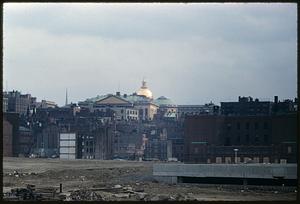 View of dome of Massachusetts State House among city buildings