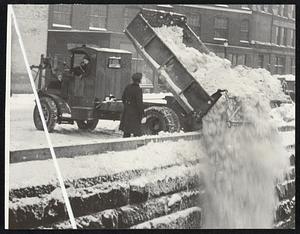 Emptying trucks in Fort Point channel