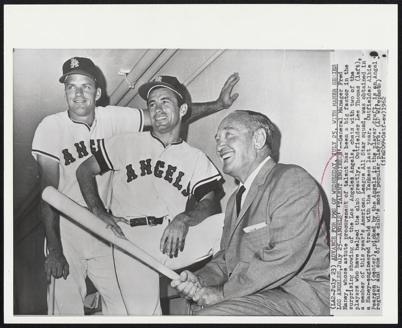 Angels’ ‘Talent Engineer’--General Manager Fred Haney, whose astute procurement of talent has been a big factor in the surprising showing of the Los Angeles Angels, chats with two of the players who have helped the club greatly. Outfielder Lee Thomas (left), a member of this year’s American League All Star squad, was obtained in a Haney-engineered trade with the Yankees last year. Outfielder Albie Pearson (center), picked by the Angels in the player draft, is an Angel regular and one of the club’s most popular players.