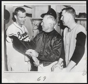 "Nothing to it," says smiling Lew Burdette, left, Milwaukee Braves pitcher to coach Charley Root, center, and catcher Del Crandall, after hurling the first shutout of the 1956 season. The righthander blanked the Cubs in yesterday's opener, 6-0, at Milwaukee.