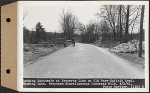 Contract No. 118, Miscellaneous Construction at Winsor Dam and Quabbin Dike, Belchertown, Ware, looking southerly at property line on Old Ware-Enfield Road, showing gate, Ware, Mass., Apr. 3, 1941