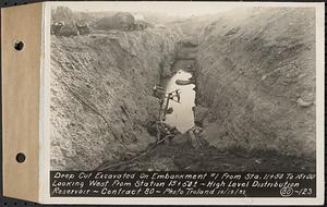 Contract No. 80, High Level Distribution Reservoir, Weston, deep cut excavated on embankment 1 from Sta. 11+50 to 15+00, looking west from Sta. 15+50+/-, high level distribution reservoir, Weston, Mass., Oct. 19, 1939