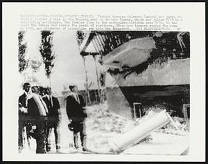 Turkish Premier Suleyman Demirel and other officials inspect a ruin in the Erzurum area of Eastern Turkey, which was jolted 8/19 by a devastating earthquake. The Premier flew to the earthquake-stricken area 8/20, to inspect the damage and assess the needs of survivors. Sharp new tremors rocked the area on 8/20, and estimates of casualties ran into the thousands.