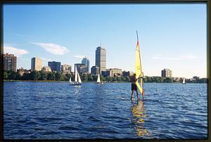 Boston (circa 1990): Sailboats and sailboard with Back Bay in the background