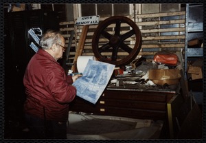Lower Pacific Mills. Maintenance room. Jim McGregor at his storage file for blueprints, graphics & drawings