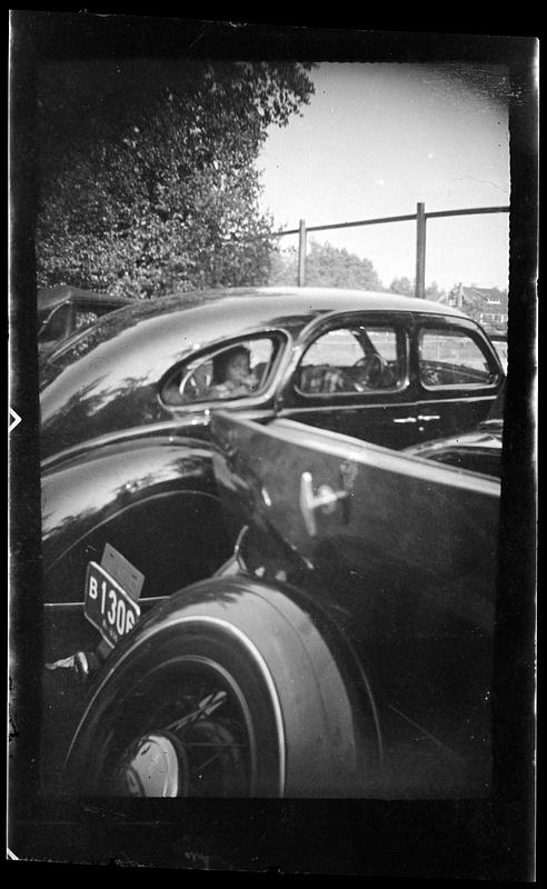 Woman sitting in the backseat of a car