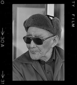 A man wearing a hat and sunglasses, Alaska