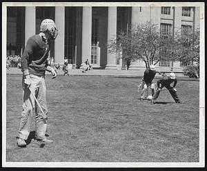 New Sport called "Fierce Croquet" has been born at Massachusetts Institute of Technology. It was the result of an observation made by a magazine that MIT students manage to bring fierce competitive skills to such pastimes as chess, debating and croquet. In this photo, "fierce croquet" starts from a huddle over the wickets.