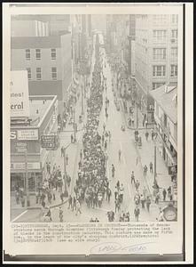 Marching in Protest-- Thousands of demonstrators march through downtown Pittsburgh Monday protesting the lack of blacks in the construction industry. This picture was made on Fifth Ave., in the heart of the city's shopping district.