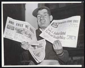 Presses Roll Again. Newsboy Harry Bardski holds Boston newspapers today (Aug.30) after papers resumed publication following three-weeks strike. The papers all carried resumes of news that had ocurred during blackout. Strike started over wage dispute with mailer's union.